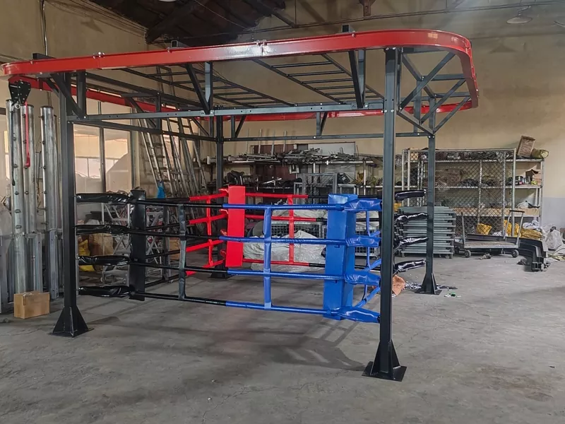 Custom multi-functional boxing training frame with integrated overhead truss system built in Pandawin Sports workshop